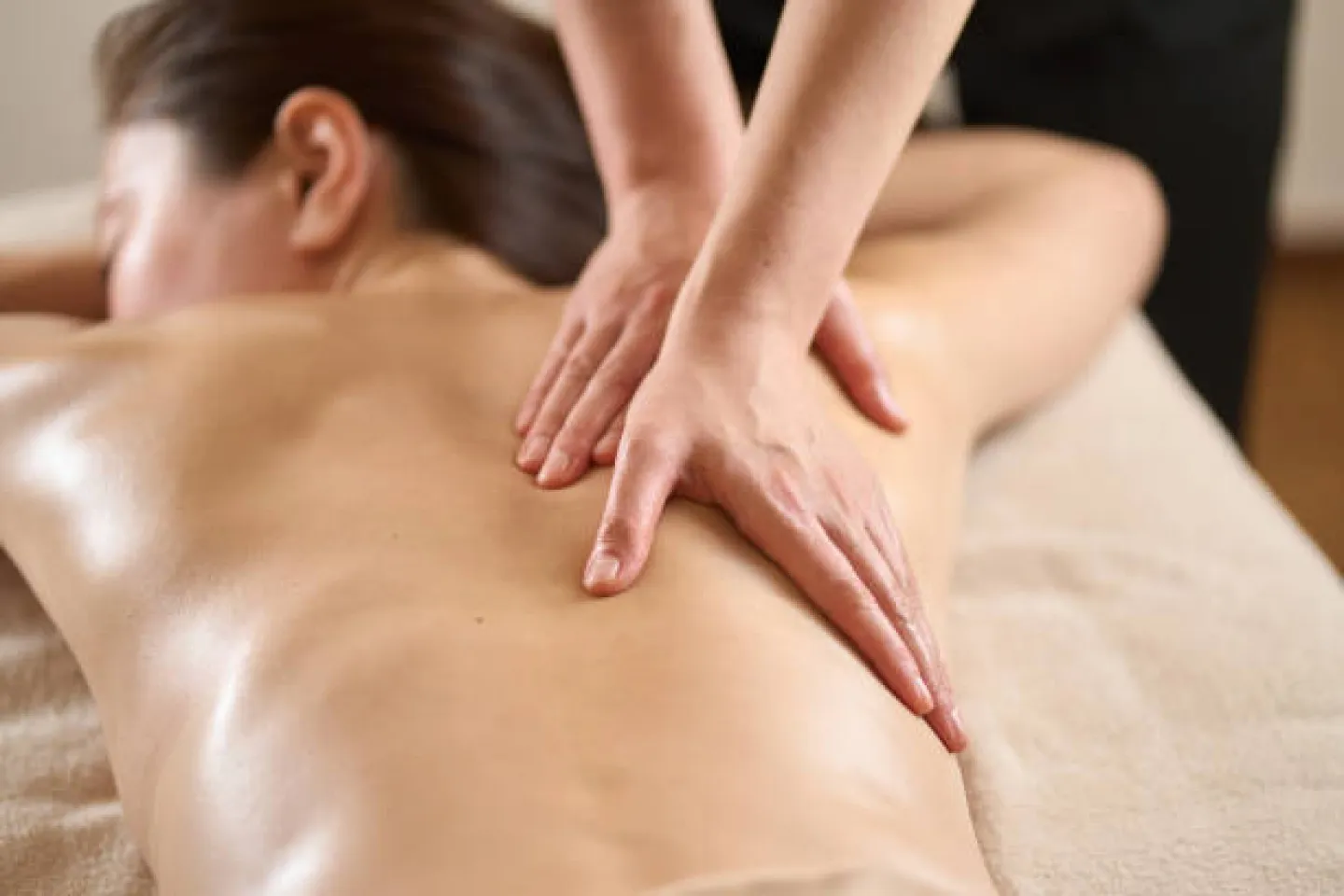 Woman giving and receiving massage