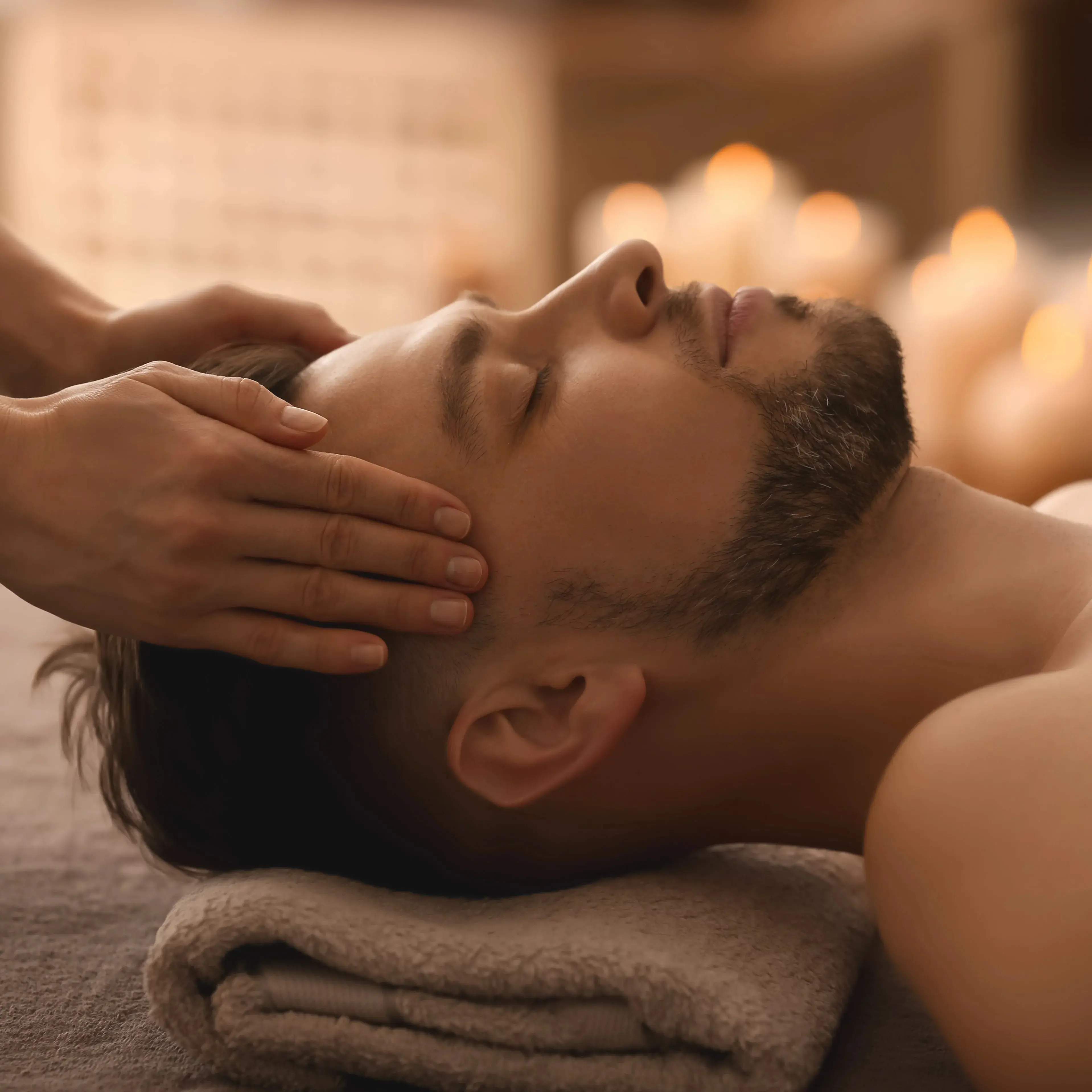 Man receiving head massage